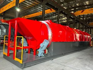Saringan trommel dengan pisau pembuka kantong bagian dalam